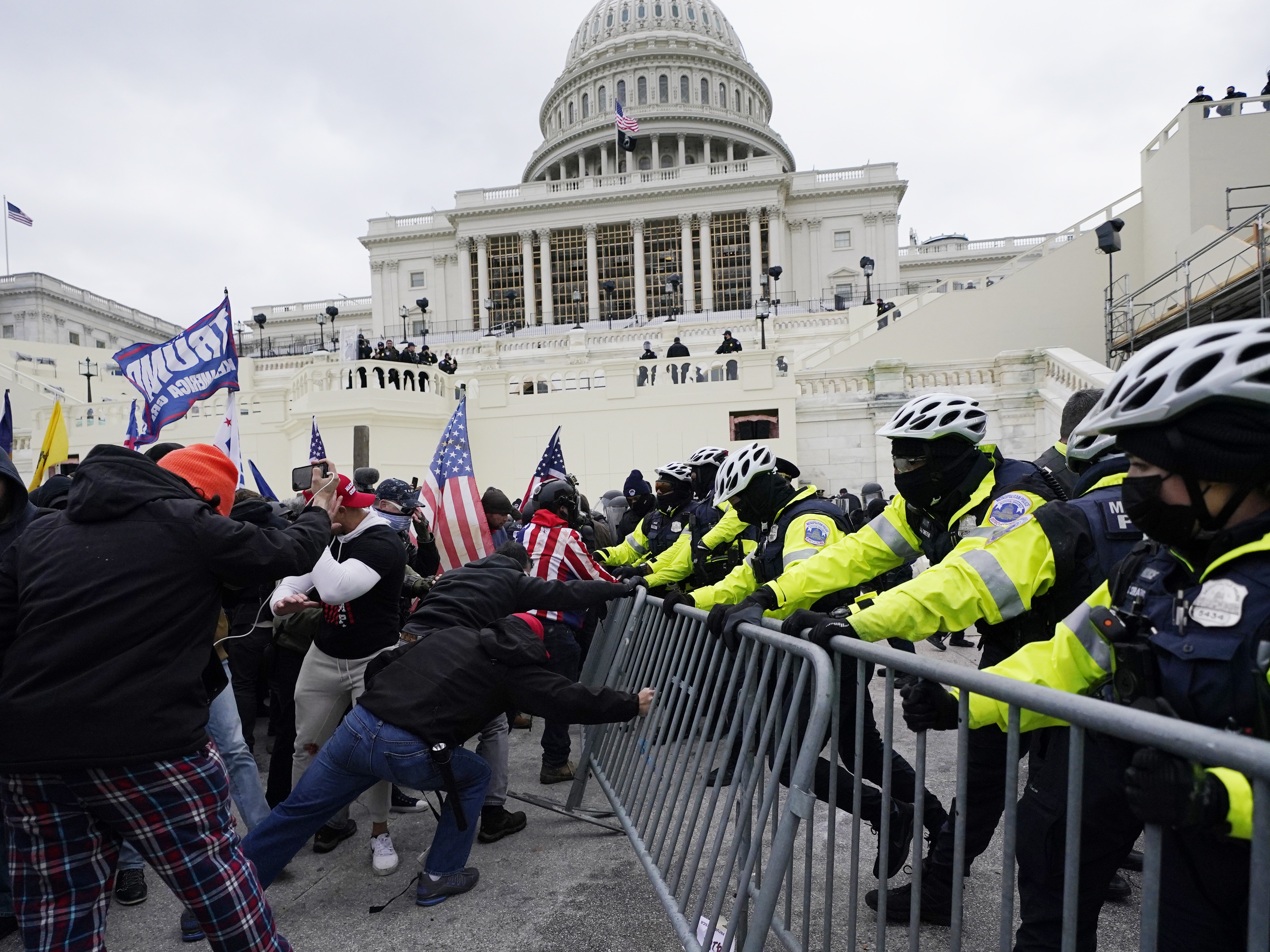 Trump supporters try to break through a police barrier on Jan. 6, 2021, at the Capitol in Washington, D.C.
